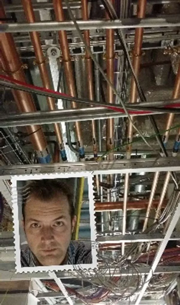 Overhead copper medical gas pipework in a ceiling void